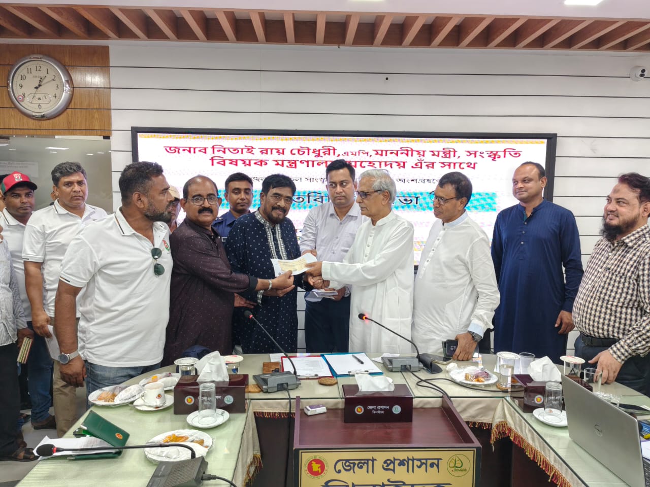 Cultural Affairs Minister Nitai Roy Chowdhury exchanges views with cultural personalities in Jhenaidah; distributes financial grants
