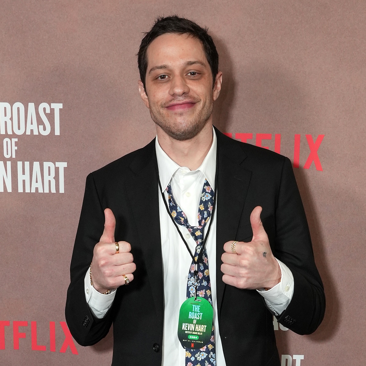 Pete Davidson in black and white as mobster Tommy Pitera in the upcoming film Tommy Karate, wearing a dark suit with hair brushed back.