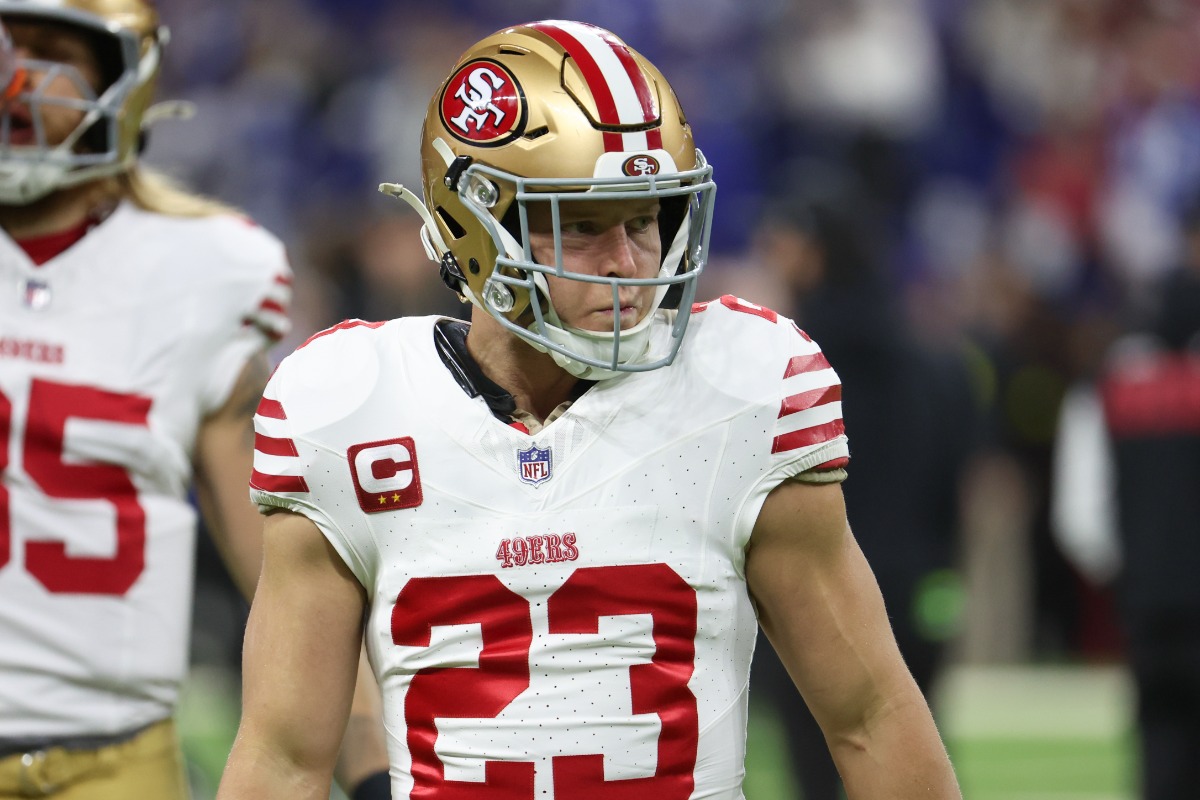 Christian McCaffrey running with the football during a San Francisco 49ers game